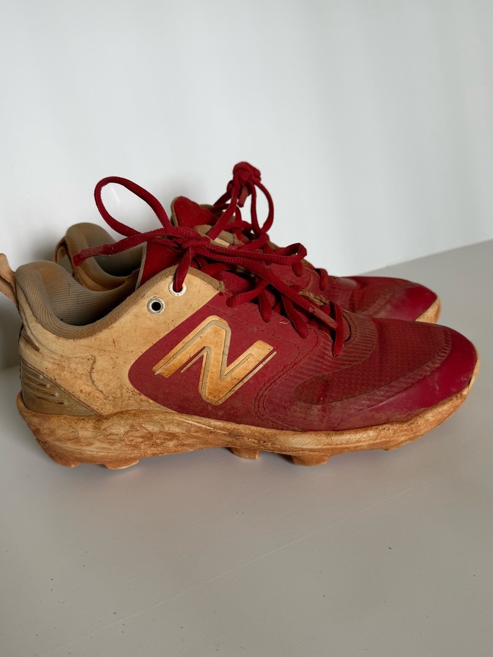 New Balance Red and White Baseball/ Softball Cleats